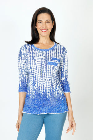 Top Ligne Dots Button Tab Top in Blue with streaming white dot pattern.  Crew neck 3/4 sleeve crinkle top.  White inset with raw edge at neck, cuff and hem.  2 tabs with button trim at left breast.  Relaxed fit._59670298198382