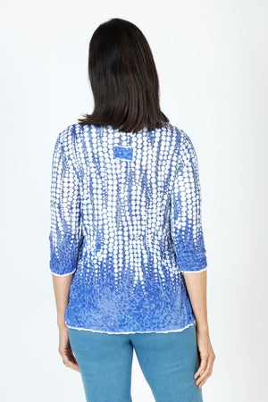 Top Ligne Dots Button Tab Top in Blue with streaming white dot pattern.  Crew neck 3/4 sleeve crinkle top.  White inset with raw edge at neck, cuff and hem.  2 tabs with button trim at left breast.  Relaxed fit._59670298231150