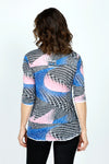 Top Ligne Space Warp Crinkle Top with Buttons & Tabs in Multi.  Black and white warped grid print with splashes of pink and blue.  Banded crew neck long sleeve top.  Straight hem.  Double tab detail at left breast with double button trim.  White raw edge insets at neck, hem and cuff.  Relaxed fit._t_59571121946990