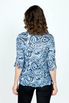 Top Ligne Retro Ripples Snap Front Shirt in Blue.  Wavy print in light blue on a navy rose print background.  Pointed collar snap front shirt with pairs of navy covered snaps.  3/4 sleeve with split cuff and lace detail.  Relaxed fit._t_59570623086958