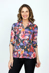 Top LIgne Mixed Flowers Snap Front Top in Multi.  Bright mixed large floral print on a black and gray rose print background.  Pointed collar snap front top with pairs of colored snaps.  3/4 sleeve with ruched hem and slit.  Shirt tail hem.  Relaxed fit._t_59570541035886