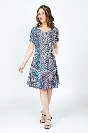 Top Ligne Cosmic Chips Dress in Multi.  Small geometric pattern.  Crew neck short sleeve crinkle dress.  Inset flounced tier at hip.  2 front patch pockets.  Side slits.  Relaxed fit._59570369757550