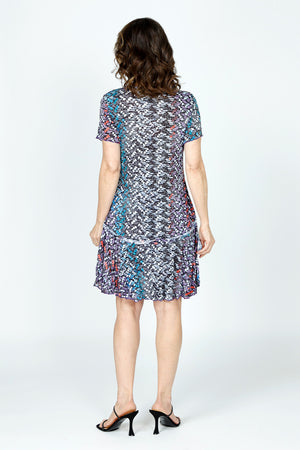 Top Ligne Cosmic Chips Dress in Multi.  Small geometric pattern.  Crew neck short sleeve crinkle dress.  Inset flounced tier at hip.  2 front patch pockets.  Side slits.  Relaxed fit._59570369823086