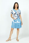 Top Ligne Doodle Lines Dress in Blue.  Large abstract scribble print in blue and black on a white background through bodice.  Inset blue on blue print flounce and 2 front patch pockets.  Banded crew neck and short sleeves.  Crinkle fabric.  Relaxed fit._t_35730633294024