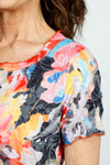 Top Ligne Watercolor Floral Crinkle Dress in Multi.  Bright washed floral print.  Crew neck dress with banded neckline and short sleeves.  Tiered inset ruffle below hip.  Side slits.  Relaxed fit._t_52933854331246