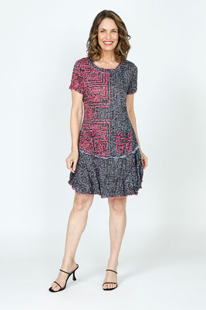 Top Ligne Geo Rose Dress.  Black & gray rose print with pink grid overlay.  Crew neck short sleeve dress with flounce inset from hip to hem.  2 front patch pockets.  Side slits.  Relaxed fit._59570387124590