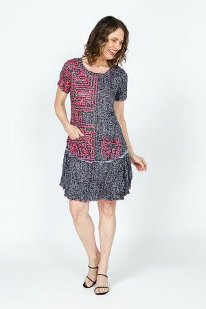 Top Ligne Geo Rose Dress.  Black & gray rose print with pink grid overlay.  Crew neck short sleeve dress with flounce inset from hip to hem.  2 front patch pockets.  Side slits.  Relaxed fit._59570387321198