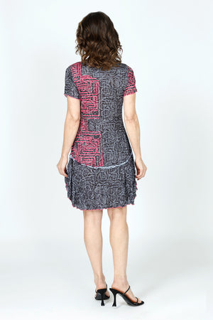 Top Ligne Geo Rose Dress.  Black & gray rose print with pink grid overlay.  Crew neck short sleeve dress with flounce inset from hip to hem.  2 front patch pockets.  Side slits.  Relaxed fit._59570387157358