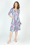 Top Ligne Color Streaks Bubble Dress in Multi.  Bright vertical streaks of color.  Banded v neck with 3/4 sleeve.  Contour seams.  2 front pouch pockets.  Inner ties can be adjusted to create an asymmetrical hemline or flounced tiered hem.  Relaxed fit._t_59699303448942