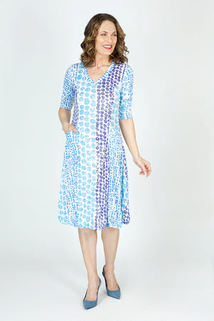 Top Ligne Dots Bubble Dress in Blue/White.  Vertical dot pattern in shades of blue on a white background.  Crinkle fabric v neck dress with 3/4 sleeve.  Contour seaming.  In seam front pockets.  Inner ties to change hem lengths; can be asymmetric or flounced as much as you want.  Relaxed fit._59699223757166