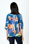 Hinson Wu Aileen Button Back Popover in Multi.  Bright tropical floral print on a medium blue background.  Pointed collar with 2 button placket.  3/4 sleeve with split turn back cuff. Back center buttons.  Relaxed fit._t_59647624053102