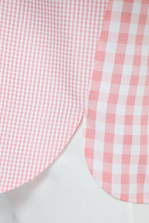 Cali Girls Judy Gingham Blouse in Pink/White.  Mixed size checks.  Pointed collar with open v.  Button front.  3/4 sleeve with fold back cuff.  Single breast patch pocket.  Back yoke with double loop detail.  Side seams wrap slightly to front with curved hem.  Relaxed fit._59821610467694