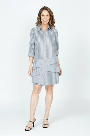 Cali Girls Jenna Stripe Dress in Black & White Stripes.  Pointed collar button down dress with 3/4 sleeves.  Asymmetric tiered ruffles in front.  Curved hem.  Relaxed fit._59563207950702