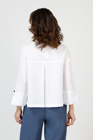 Habitat Crinkle Swing Jacket in White.  Crinkle fabric.  Adjustable wire collar button down with novelty buttons.  2 front angled pockets with button detail. 3/4 sleeve with split cuff and single button detail.  Back yoke and inverted back pleat.  Relaxed fit._59821382861166