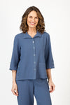 Habitat Crinkle Camp Shirt in Indigo.  Pointed collar button down with color matched buttons.  Wrapped to front side seams with 3 button detail.  Single front patch pocket.  3/4 sleeve with 2 button detail placket cuff. Back yoke. Relaxed fit._t_59821439582574