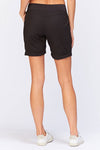 Wearables Clarissa Short in Black. Pull on short with jersey waistband. Poplin body with 2 front slash pockets and 2 cargo pockets on leg. 7" inseam._t_35797327413448