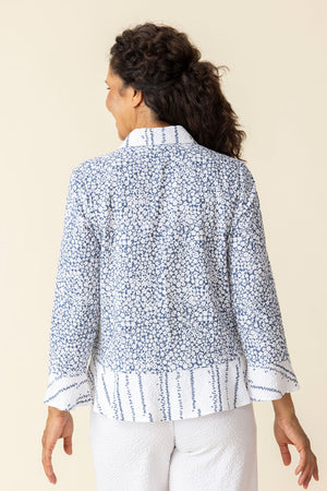 Habitat Crinkle Floral Flounce Shirt in White.  Mixed prints.  Body is miniature floral print. 3/4 floral print sleeve. Line print pointed collar, button placket, flounce hem inset and flounce cuff.  A line shape. Relaxed fit. _59770474561902