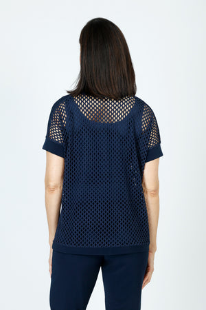 Honeycomb Boxy Top in Navy.  Open weave body.  Dolman short sleeves.  Solid jersey trim at crew neck, hem, shoulder and cuff.  Boxy shape. Relaxed fit._59772247703918