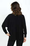 Sympli Trim Boxy Top in Black.  Crew neck with long dolman sleeve and banded cuff.  Diagonal front seam with pieced asymmetric hem.  Boxy fit._t_59519394775406