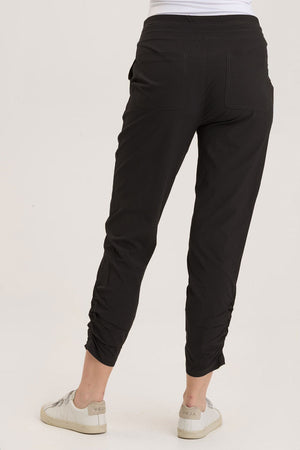 Wearables Active Lyan Pant in Black.  Elastic drop waist pull on pant.  Ruched detail at lower leg.  2 front slash pockets.  27 1/2" inseam._59448062509422