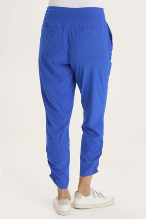 Wearables Active Lyan Pant in Cobalt.  Elastic drop waist pull on pant.  Ruched detail at lower leg.  2 front slash pockets.  27 1/2" inseam._59448062542190