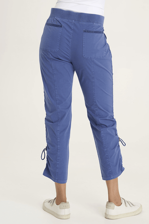 XCVI Otish Pant in Stellar Blue.  Pull on pant with jersey waistband and poplin body.  2 front slash pockets with curved raw edge and grommet detail. 2 back patch pockets.  Front and back center seams.  Side cinch cord with toggle closure.  28" inseam._59594384769390