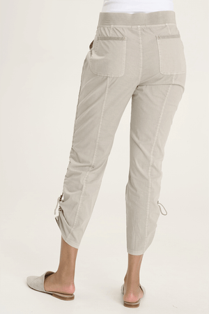 XCVI Otish Pant in Whitecap, a light beige.  Pull on pant with jersey waistband and poplin body.  2 front slash pockets with curved raw edge and grommet detail. 2 back patch pockets.  Front and back center seams.  Side cinch cord with toggle closure.  28" inseam._59594384736622