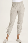 XCVI Otish Pant in Whitecap, a light beige.  Pull on pant with jersey waistband and poplin body.  2 front slash pockets with curved raw edge and grommet detail. 2 back patch pockets.  Front and back center seams.  Side cinch cord with toggle closure.  28" inseam._t_59594384867694