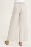 XCVI Pheodora Embroidered Pant in Whitecap, a light beige.  Terry elastic waistband.  2 deep front pockets with grommet detail and soft pleating.  Front center seams.  Hand-drawn embroidery.  2 back patch pockets. Wide leg. 29" inseam._t_59594501128558