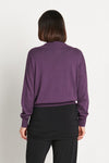 Planet Preppy Sweater in Plum. Pima cotton/modal soft knit. V neck with attached rib polo collar. Long sleeves. Drop shoulder. Rib trim at neck, hem and cuff. One size fits many. Relaxed fit._t_35944223244488