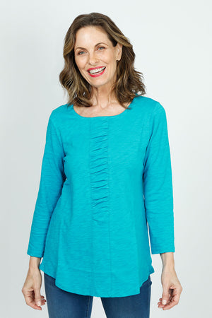 Habitat Pebble Ruched Shirt in Capri. Crew neck 3/4 sleeve top with ruched detail down center front. Pebble cotton. Relaxed fit._35978113908936