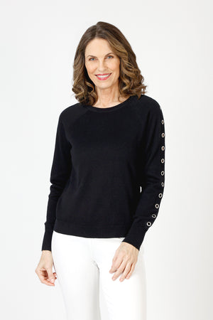 Lolo Luxe Grommet Sweater in Black.  Crew neck long sleeve sweater with metal grommet detail down center of each sleeve.  Rib trim at neck, hem and cuff.  Relaxed fit._59840767623534