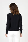 Lolo Luxe Grommet Sweater in Black.  Crew neck long sleeve sweater with metal grommet detail down center of each sleeve.  Rib trim at neck, hem and cuff.  Relaxed fit._t_59840767754606