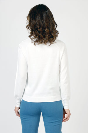 Lolo Luxe Grommet Sweater in White.  Crew neck long sleeve sweater with metal grommet detail down center of each sleeve.  Rib trim at neck, hem and cuff.  Relaxed fit._59840767689070