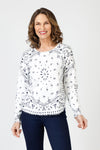 Lolo Luxe Bandanna Print Sweater in White.  Blue bandanna print on white.  Crew neck long sleeve sweater with dropped shoulder.  Curved hem.  Rib trim at neck hem and cuff.  Frayed edges at hem and cuff.  Relaxed fit._t_59844335370606