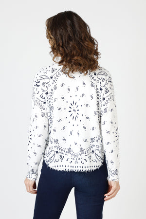 Lolo Luxe Bandanna Print Sweater in White.  Blue bandanna print on white.  Crew neck long sleeve sweater with dropped shoulder.  Curved hem.  Rib trim at neck hem and cuff.  Frayed edges at hem and cuff.  Relaxed fit._59844335305070