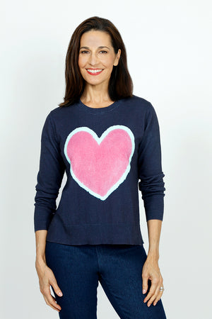 Lolo Luxe Big Heart Crew Sweater in Navy with pink heart edged in light aqua.  Richly dyed knit with crew neck and long sleeves.  Side slits.  Rib trim at neck, hem and cuff.  Relaxed fit._59652819091822