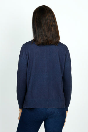 Lolo Luxe Big Heart Crew Sweater in Navy with pink heart edged in light aqua.  Richly dyed knit with crew neck and long sleeves.  Side slits.  Rib trim at neck, hem and cuff.  Relaxed fit._59689009578350