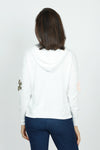 Lolo Luxe Pastel Flower Hoodie in White.  Textured felt floral applique in soft pastel colors in front and sleeves.  Plain back.  Crew neck with attached drawstring hood.  Long sleeves.  Rib trim at neck, hem and cuff.  Side slits. Relaxed fit._t_59688605319534