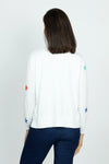 Lolo Luxe Multi Star Crew Sweater in White.  Multicolored intarsia knit stars on front and sleeves.  Plain back.  Long sleeves.  Rib trim at neck, hem and cuff.  Side slits.  Relaxed fit._t_59742193549678