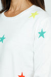 Lolo Luxe Multi Star Crew Sweater in White.  Multicolored intarsia knit stars on front and sleeves.  Plain back.  Long sleeves.  Rib trim at neck, hem and cuff.  Side slits.  Relaxed fit._t_59742193484142