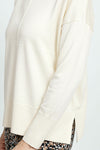 Metric Pull Over Seam Sweater in Cream. Crew neck long sleeve sweater with center raised seams.  Deep rib trim at hem and cuff.  Rolled neckline.  Relaxed fit._t_59513438142830