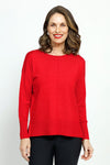 Metric Pull Over Seam Sweater in Fiery Red.  Crew neck long sleeve sweater with center raised seams.  Deep rib trim at hem and cuff.  Rolled neckline.  Relaxed fit._t_59513438175598