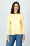 Metric Pull Over Seam Sweater in Pale Yellow.  Crew neck long sleeve sweater with center raised seams.  Deep rib trim at hem and cuff.  Rolled neckline.  Relaxed fit._t_59611327431022