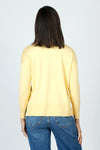 Metric Pull Over Seam Sweater in Pale Yellow.  Crew neck long sleeve sweater with center raised seams.  Deep rib trim at hem and cuff.  Rolled neckline.  Relaxed fit._t_59611327463790