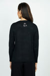 Metric Sequin Shapes Sweater in black.  Abstract shapes on front formed from rhinestone studs look like animal print.  Crew neck long sleeve sweater.  Rib trim at neck hem and cuff.  Rhinestone shape insignia at back neck.  Relaxed fit._t_52985411404142