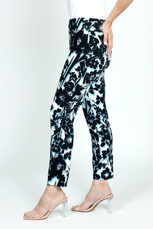 Holland Ave Shadow Floral Ankle Pant in Black/White/Sky.  Black abstract floral print with sky blue shadowing on a white background.  2 1/2" curved waistband pull on pant.  Snug through hip and thigh, slim to hem.  28" inseam._59575666311534