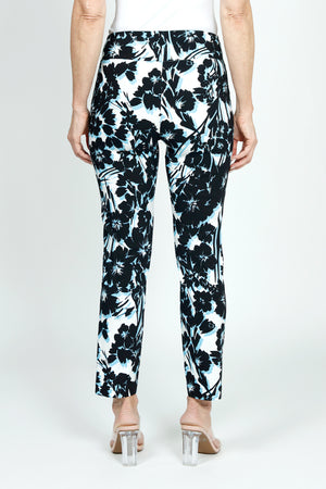 Holland Ave Shadow Floral Ankle Pant in Black/White/Sky.  Black abstract floral print with sky blue shadowing on a white background.  2 1/2" curved waistband pull on pant.  Snug through hip and thigh, slim to hem.  28" inseam._59575666245998