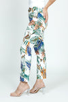 Holland Ave Tropical Leaves Ankle Pant.  Green, blue and orange large palm leaf print on an ivory background.  2 1/2" curved elastic waistband.  Snug through hip and thigh, slim through leg.  28" inseam._t_59575599300974