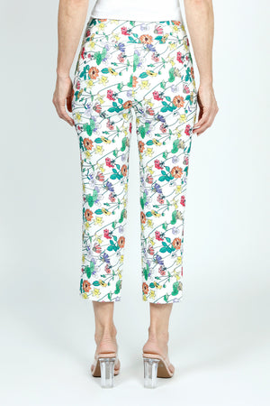 Holland Ave Bright Floral Crop with Pockets.  Soft ponte pull on pant with 2 1/2" curved waist band.  2 front slash pockets.  Snug through hip.  Slim through leg.  25" inseam._59490950087022